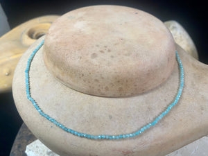 Natural clear blue amazonite facet cut fine bead choker. Brass screw clasp. Length 39.5 cm