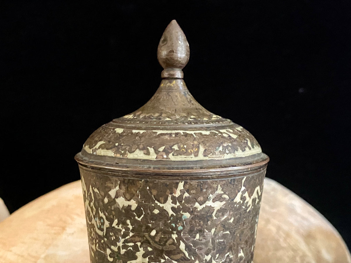 Russian Orthodox church communion chalice. Early 20th century. Engine turned brass with elaborate inlay enamel decoration in white with blue and red highlights. The enamel work is very worn and rubbed in places. Height 15 cm, width 6.5 cm.