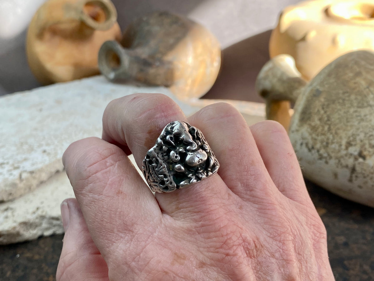 Vintage silver Ganesh ring from Rajasthan, India, weighing over 15 grams. A beautiful depiction of Lord Ganesha with small open piercings to each side of Ganesh and an image of the Tree of Life on the back. This is a stunning silver ring that can worn by men or women. Ganesh: 2 x 1.7 cm Size: 18.25 mm| Size 8