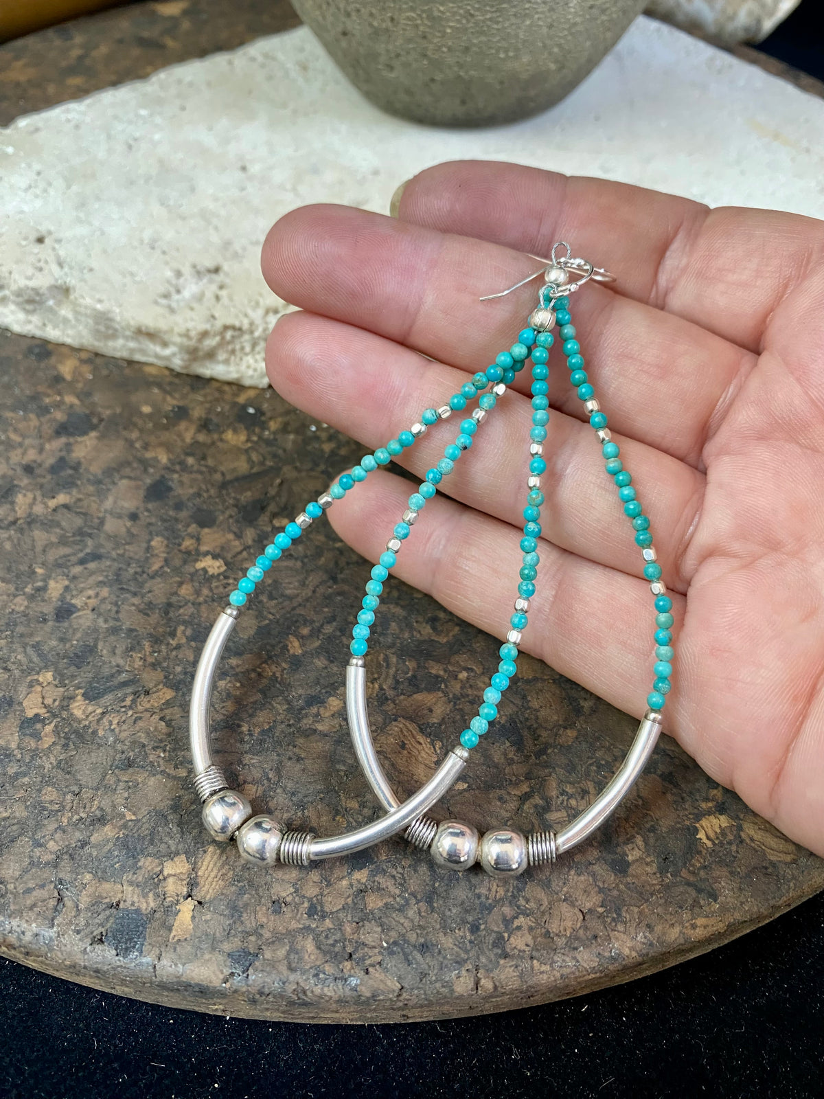 Hand crafted using tiny natural turquoise beads and 925 sterling silver. These very long earrings are unique.  Natural Arizona turquoise Sterling silver hooks and bead detailing Light and easy to wear  Measurement: total height including hook approximately 9.5 cm (3.75 in)