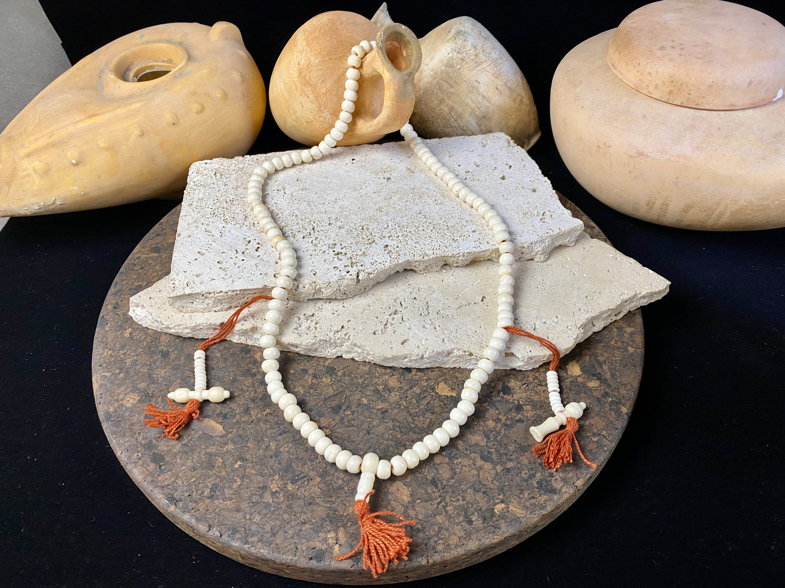 Women or men’s mala necklace. Made from buffalo bone, 108 beads and two spacers in the form of the bell and the dorje, symbols of Avalokiteshvara, the Compassionate Buddha.  Total length 64 cm. Fits easily over the head. Bone beads 5 mm diameter