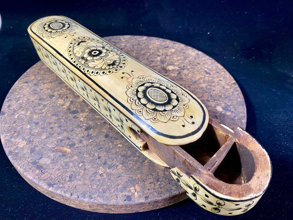 traditional Indian pen boxes. Crafted from panels of camel bone over wood, fitted together then painted with detailed black scroll work. Length 28 cm