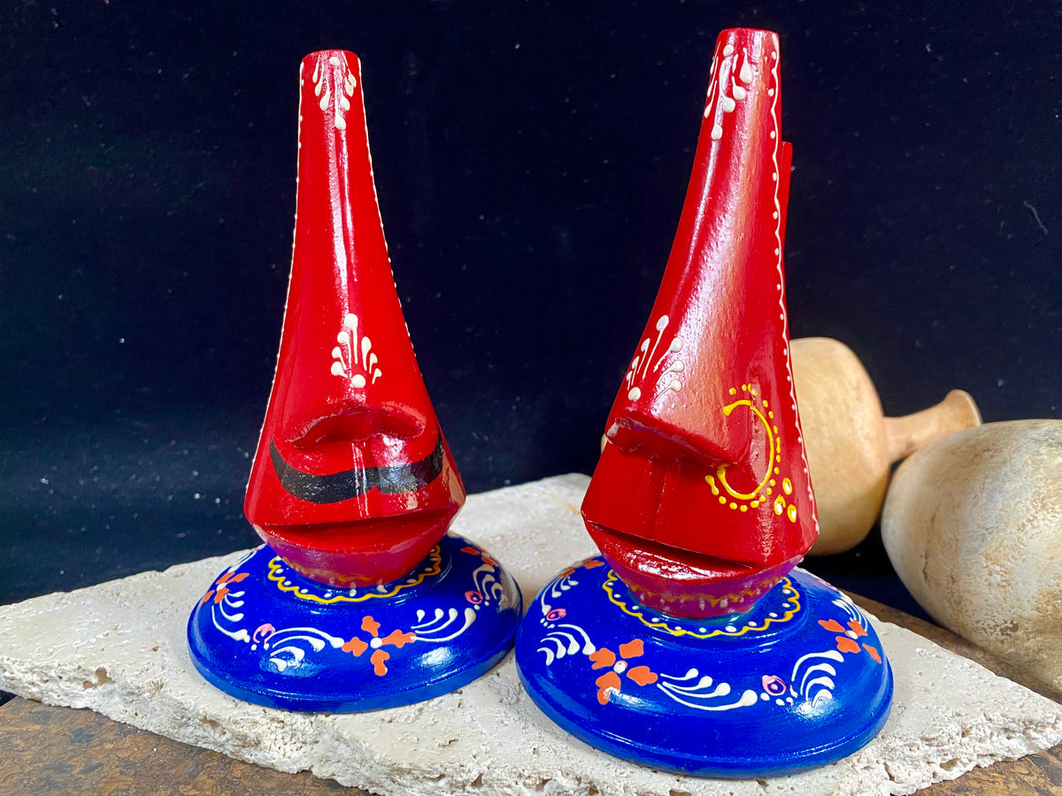 Always losing your glasses and sunglasses at home? We have the solution. Hand crafted from lightweight wood, these very cool little guys are traditionally called chasma stands and they will make sure you never misplace your sunglasses or glasses again. From India Measurements: height 15 cm