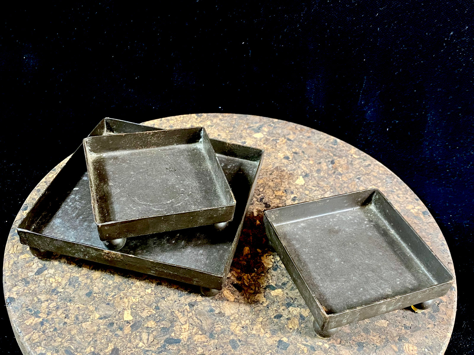 Black iron, footed candle trays