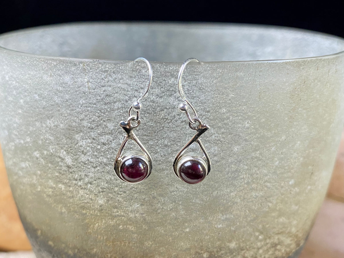 Simply elegant earrings with a difference. Sterling silver hooks complete the look. Our earrings are open-backed to allow the natural light of the cabochon stones to show through. Length including hook 2.7 cm