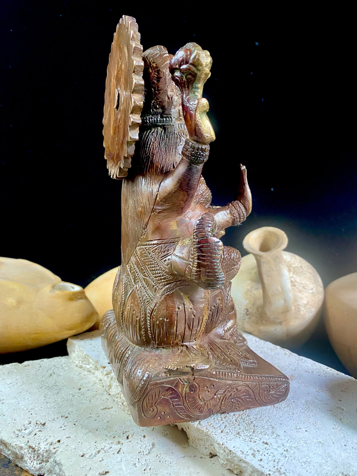 A statue of the goddess Laxmi (or Lakshmi), Hindu goddess of wealth and prosperity. Cast from solid brass, her features are exquisitely detailed, while her face, hands and feet are polished. Her right hand is raised in the gesture of protection and her left hand holds a pot symbolising abundance. Measurements: 19.8 cm height, width12 cm, depth 8.3 cm