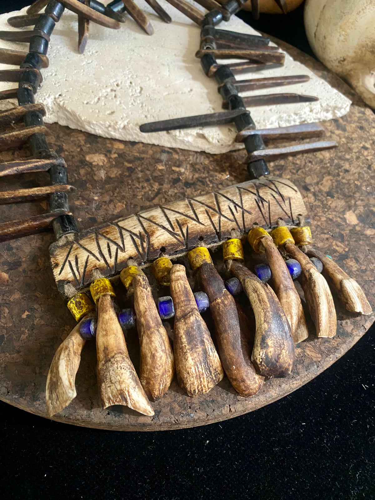 long buffalo tooth and bone necklace. It's made with a combination of buffalo bone, buffalo tooth and ceramic beads. This is a new necklace made in typical Naga tribal style. Length 45 cm