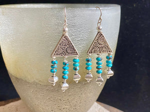 Stylish 3 strand chandelier earrings made from turquoise and sterling silver handmade chandelier pieces, detailing and hooks. Stunning, with an ancient Roman look and feel. Measurements: Length approximately 6.8 cm with hook