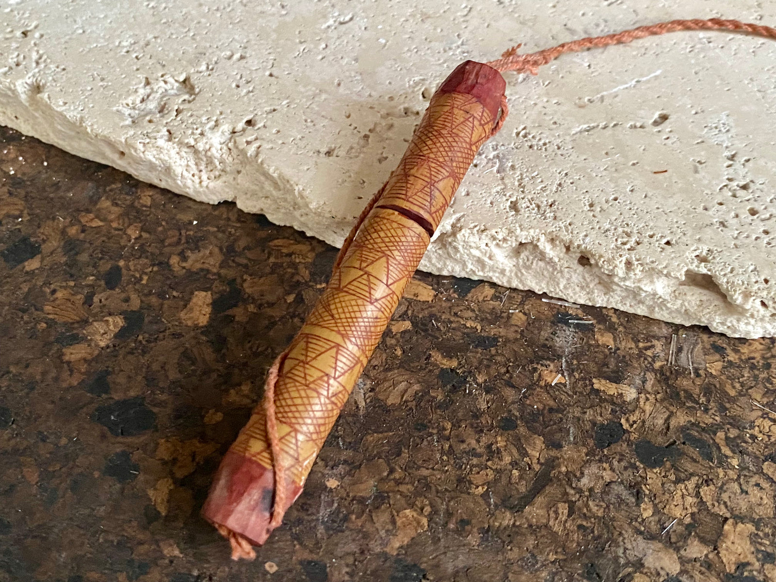 This is a vintage wood sewing needle case from northern Thailand, from the Ahka tribe. This beautiful, old and rare vintage piece is highly decorated and made from bamboo, etched, stained with red betel juice and. Length 8.5 cm.