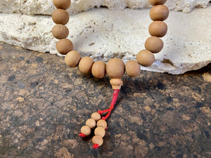 Women or men’s Buddhist mala necklace. Natural sandalwood, 108 beads. Total length 96 cm. Sandalwood beads are 8 mm diameter