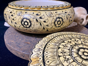 A beautiful low oval lidded bowl or box, traditionally called an opium pot because of its shape. Crafted from hand shaped panels of camel bone over wood, then hand painted. Hand made in Rajasthan, India. Measurements: diameter 24.5 cm, height 10 cm.