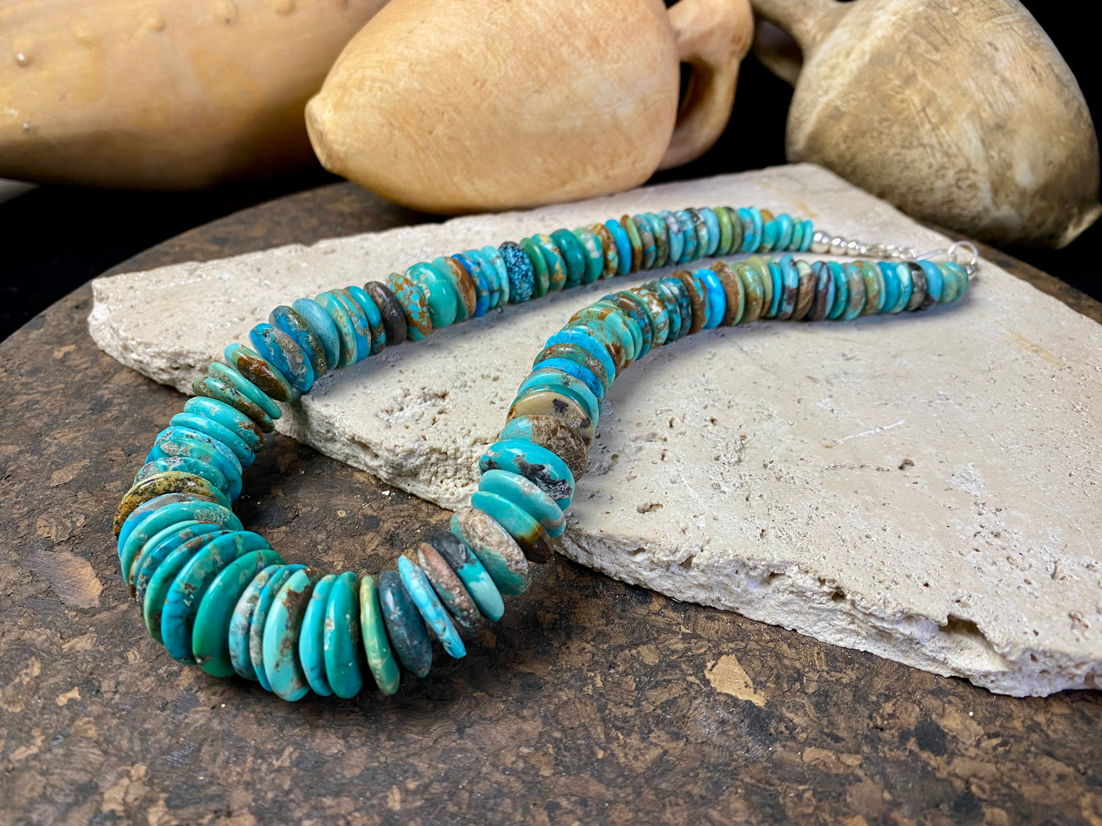 Stunning bright blue Arizona turquoise necklace featuring graduated disks of Arizona turquoise finished with sterling silver. Length 47.5 cm