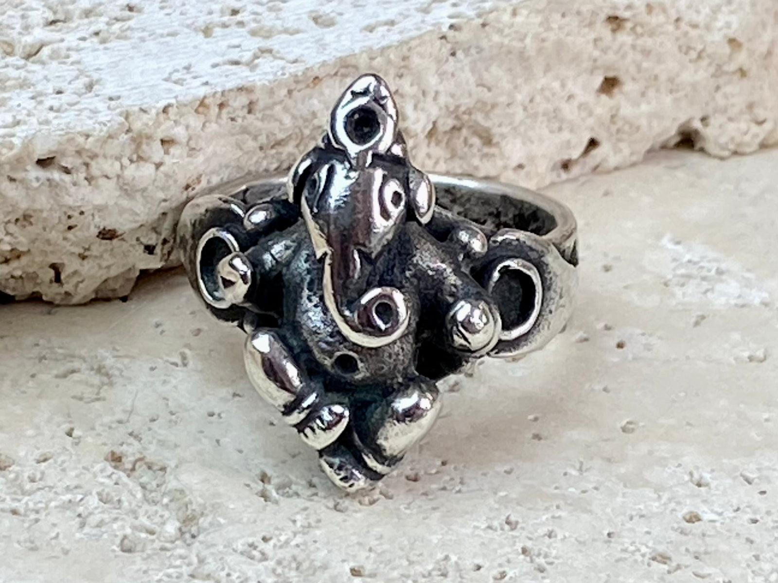 Heavy silver Ganesh ring from Rajasthan, India. Sterling silver or higher, weighing over 13 grams. This is one of the nicest depictions of Lord Ganesha we have ever seen. Really stunning and weighty silver ring.  Measurements:  Ring face: 2.2 x 1.5 cm Size: 19 mm| Size 9