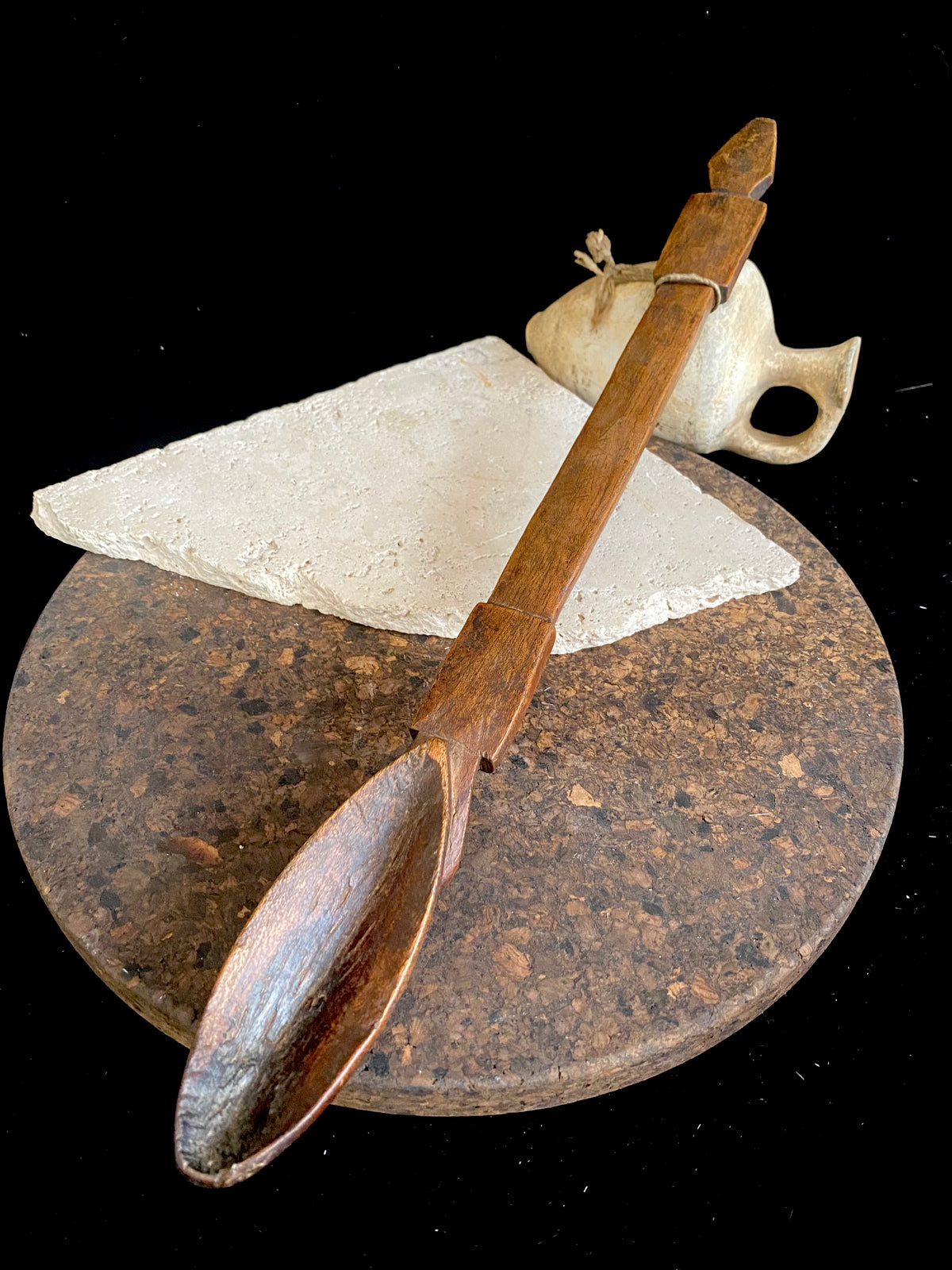 Very old wood serving spoon or ladle. Hand carved fine grained wood. From northern Ethiopia.This spoon has a lovely worn patina commensurate with its age. The spoon end is darkened from use in or near an open fire. Early 20th century. Length 44.5 cm