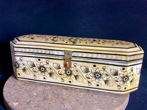 A beautiful rectangular hinged and lidded box crafted from hand shaped panels of camel bone over wood, which is then exquisitely hand painted. Hand made in Rajasthan, India. Measurements: length 31 x depth 11 cm, height 10 cm. 