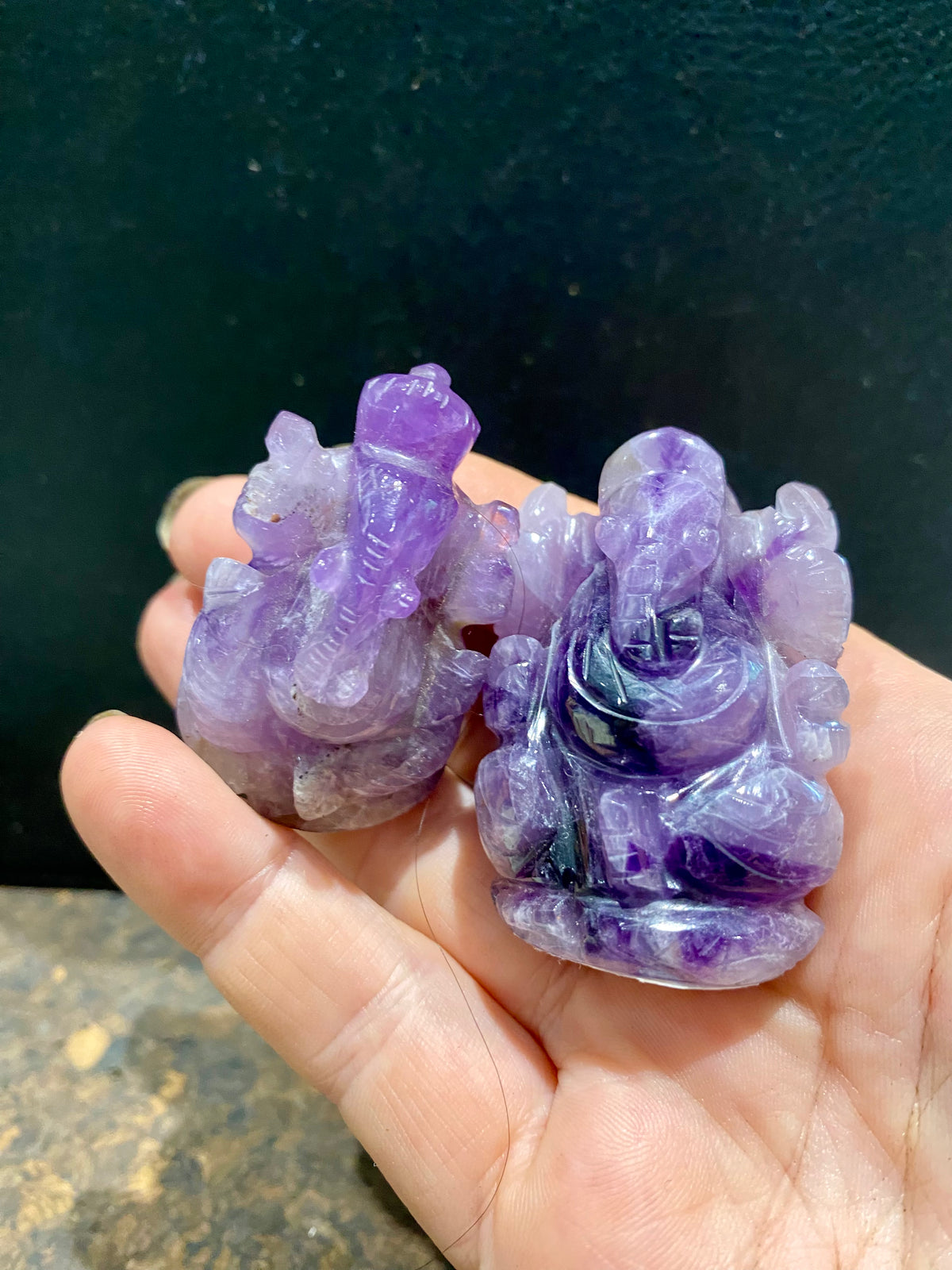 Hand carved from high quality, solid chunks of amethyst crystal, measurements: Large - 4.3 cm height, width at base 3 cm, Small - 3.7 cm height, width at base 2.6 cm