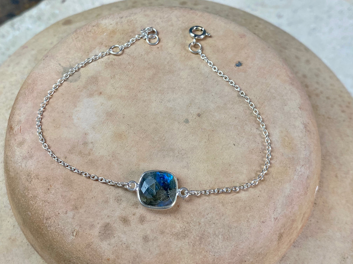 Elegant bracelets set with single stones in a sterling silver chain and clasp. Note that these bracelets are adjustable in length to suit your wrist size  Measurements: 17.2 - 19.8 cm length