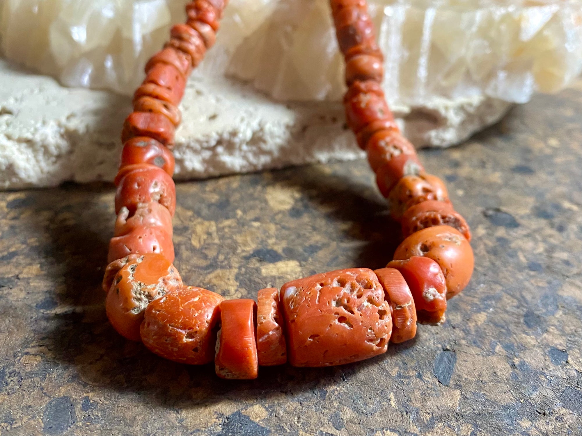 A stunning necklace of graduated antique red coral from the Himalayas, purchased in northern Thailand in 2004 and finished with a sterling silver clasp. This strand has 88 beads including a magnificent centre bead and weighs 55 grams. Length 45.5 cm