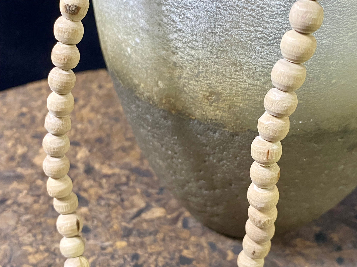 Women or men’s mala necklace, made from natural tulsi wood. As per a standard Buddhist mala, it contains 108 beads. From India