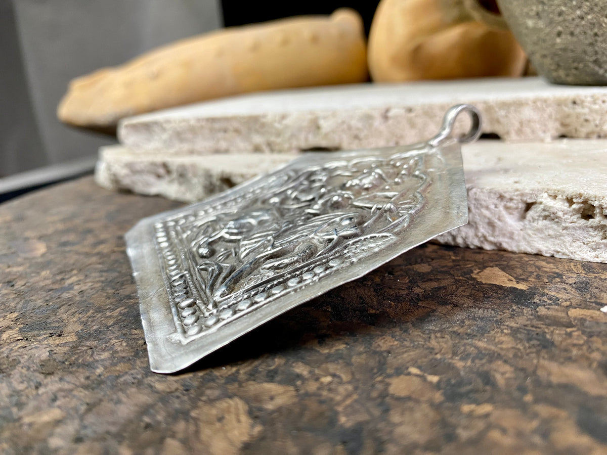 Very large Durga amulet - wear as a pendant or hang as an ornament. Early 20th century, the bail has been replaced at some stage as it most likely wore through..  Measurements: height 8.5 cm including bail, width 6.5 cm