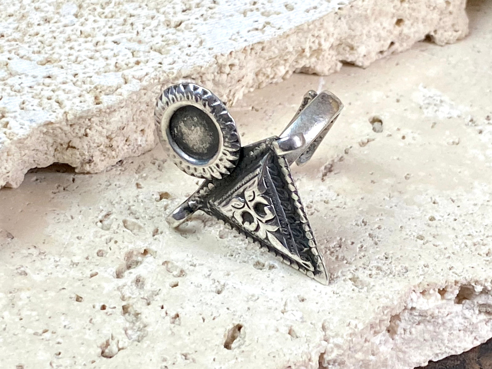 Stunning silver tribal ring from Rajasthan, India. High grade silver. Adjustable back so it will fit a number of finger sizes. Measurements:  Ring face: 3.4 x 2.8 cm Size: Anywhere from size 6 to size 8, this ring is adjustable