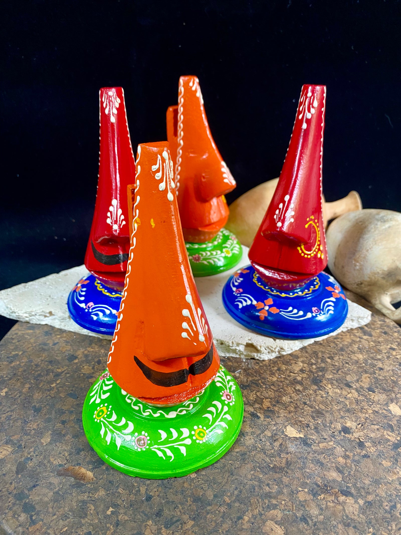 Always losing your glasses and sunglasses at home? We have the solution. Hand crafted from lightweight wood, these very cool little guys are traditionally called chasma stands and they will make sure you never misplace your sunglasses or glasses again. From India Measurements: height 15 cm