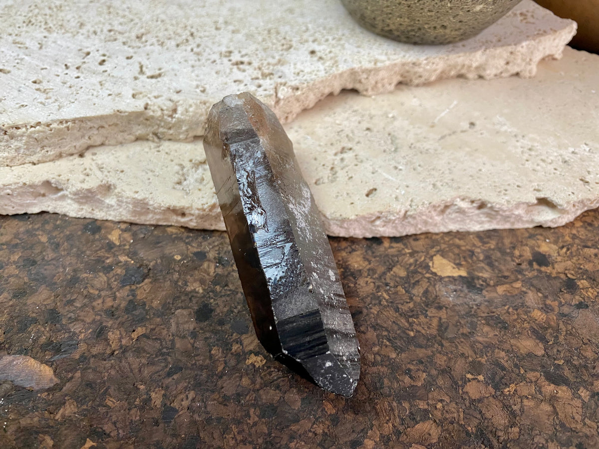 Natural smokey quartz crystal points.  Measurements: our crystals are approximately 8 cm in  length