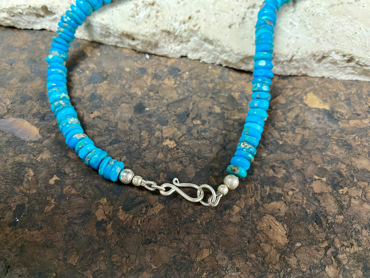 Heshi cut deep blue Arizona turquoise finished with sterling silver. length 44 cm