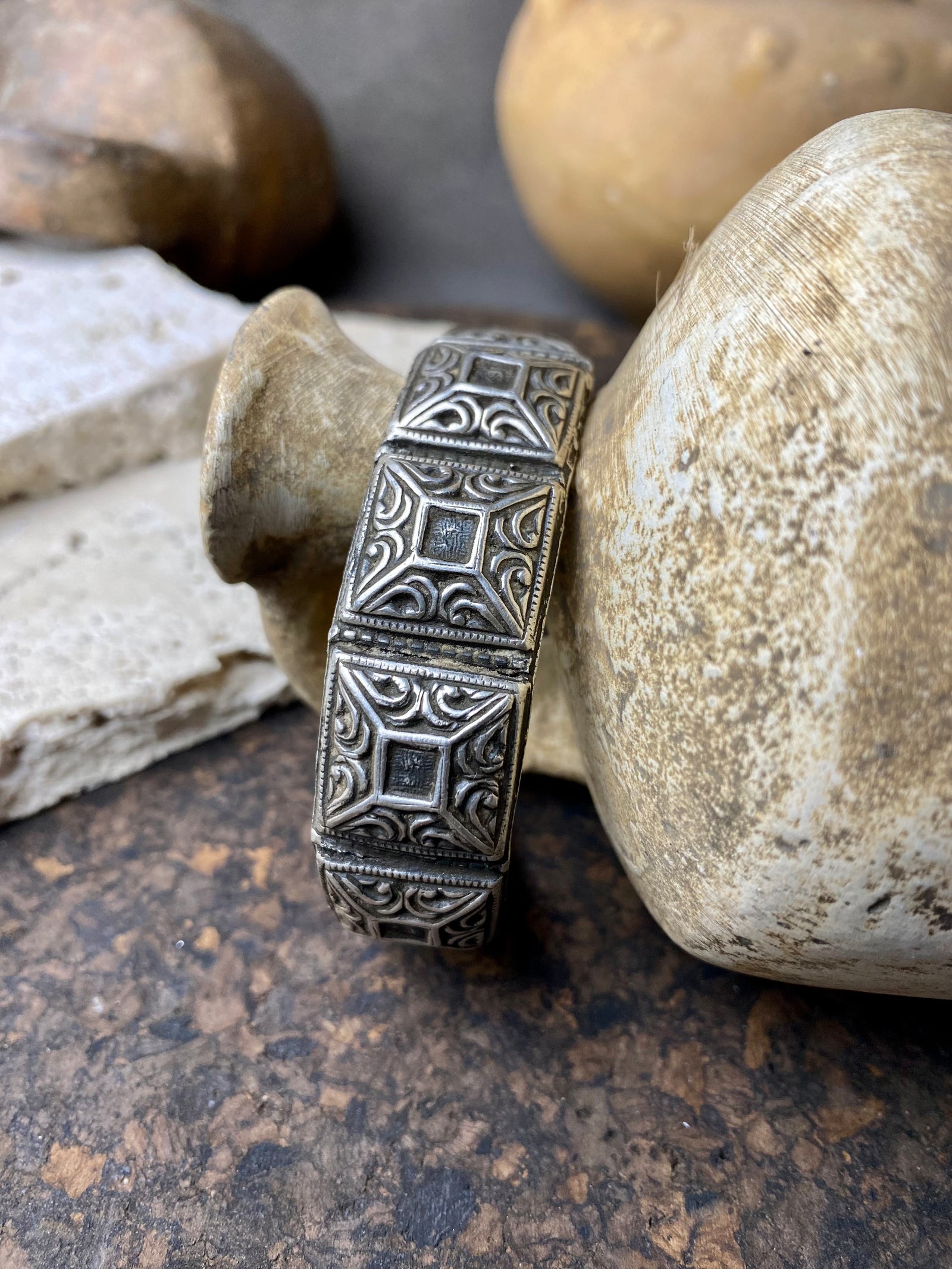 A modern interpretation of an antique style of bracelet, this fine cuff is hand crafted from sterling silver by Rajasthani silversmiths. Exquisitely detailed, the oxidised finish shows off the workmanship beautifully. There is some small room for movement in this cuff, and it is designed to fit an average sized wrist.  Measurements: Inside opening is 6.5 cm, with room for expansion or contraction