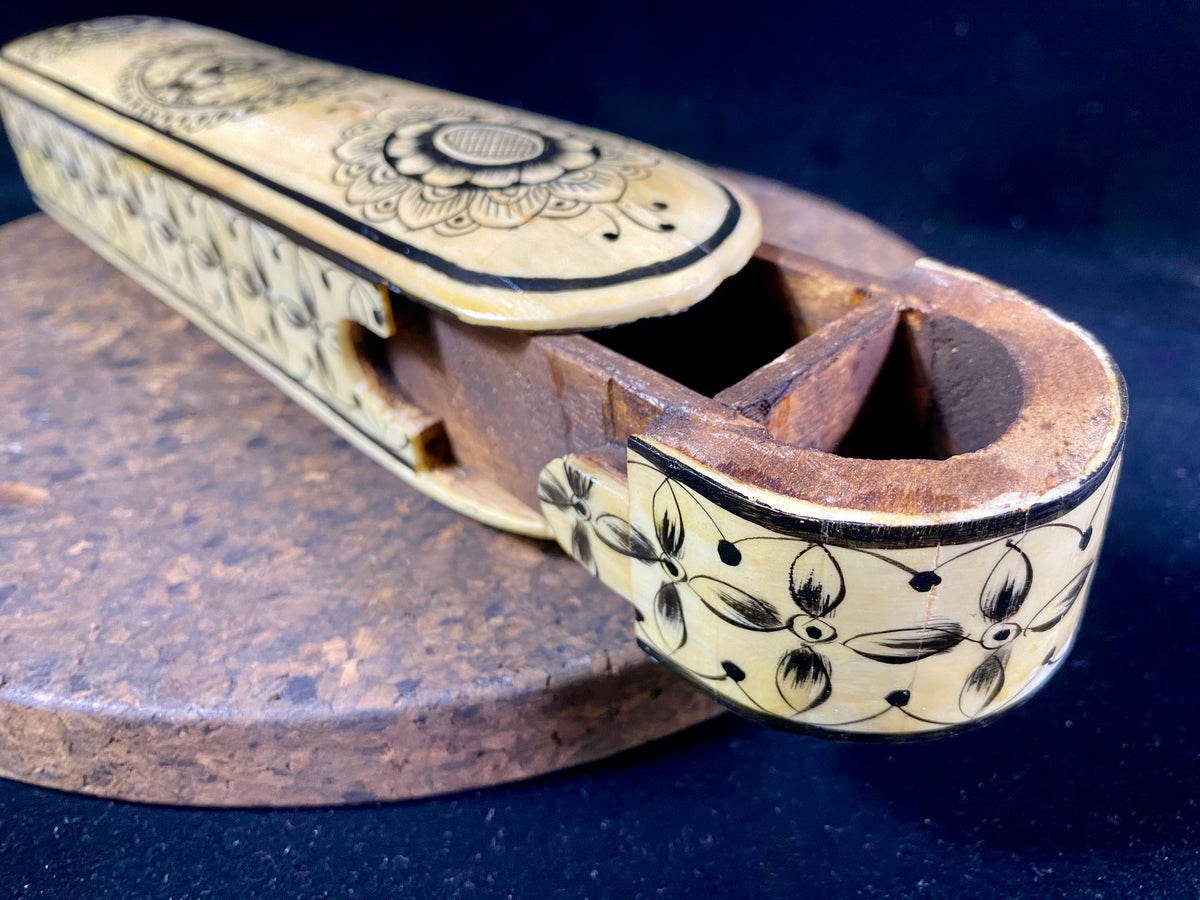 traditional Indian pen boxes. Crafted from panels of camel bone over wood, fitted together then painted with detailed black scroll work. Length 28 cm
