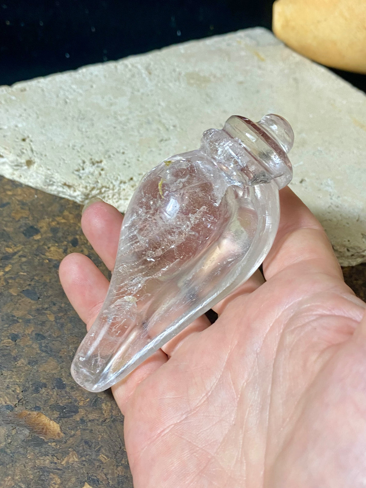 Hand carved conch shell. This vintage piece is carved from a solid piece of Himalayan rock crystal (quartz). The conch shell is sacred to both Hindus and Buddhists. Hand carved in Nepal. Measurements: length 10 cm, width at widest point 4.5 cm