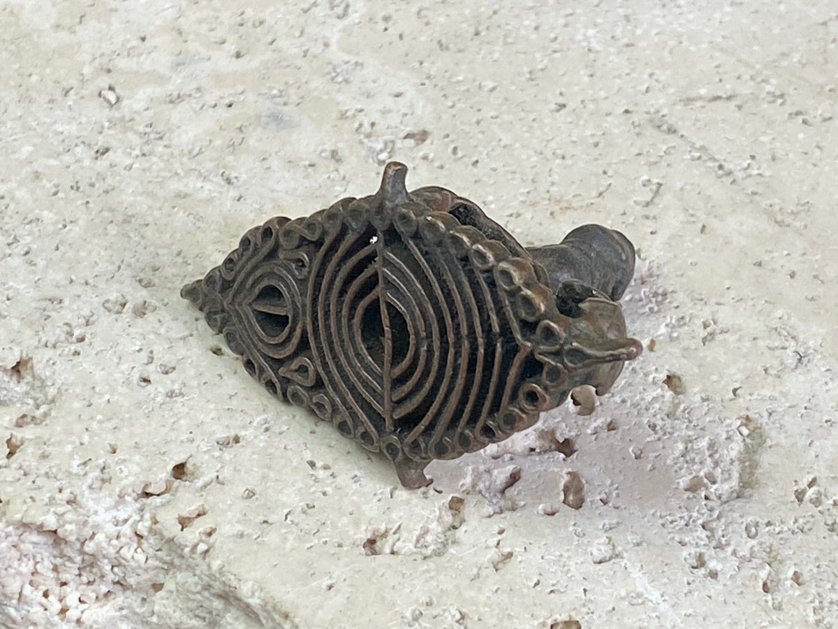 Made from a copper bronze alloy, these east Indian temple stamps are made via the lost wax method of casting and are called Chhapa stamps. They originate in Orissa and Bengali temples, India - ca. 1900.