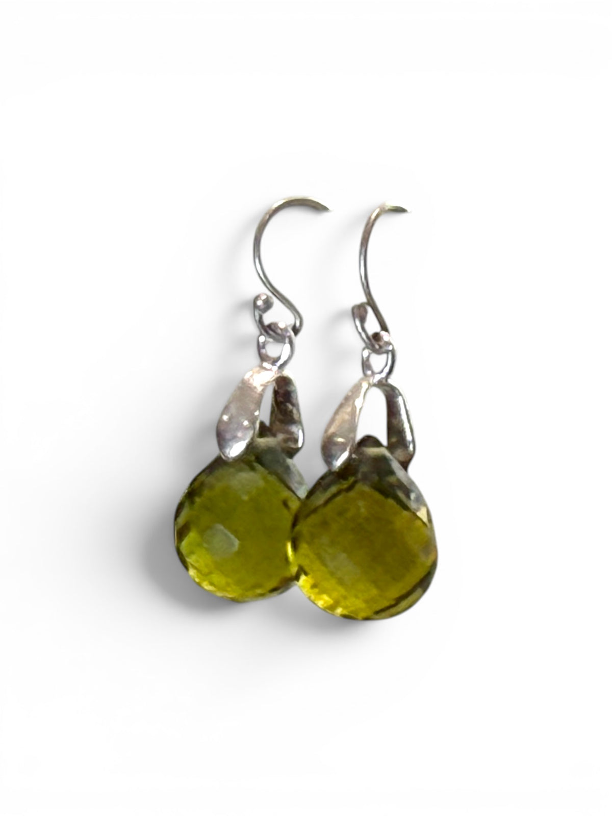 Elegant teardrop green amethyst earrings featuring facet cut gem quality stones with sterling silver mounts and hooks. Height 2.7 cm including hook