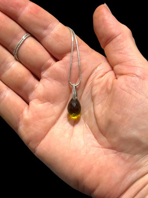 Simple teardrop green amethyst pendant features a facet cut gem quality stone with an elegant sterling silver mount. Height 2.3 cm including hook