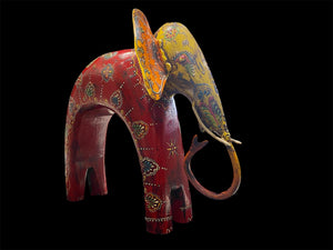 Hand made from hard wood and recycled iron, our beautiful elephant statues are painted in bright embossed detail. Large: height 27 cm, length 32 cm, depth 12 cm. Small: height 12 cm, length 15 cm, depth 6 cm