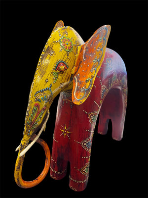 Hand made from hard wood and recycled iron, our beautiful elephant statues are painted in bright embossed detail. Large: height 27 cm, length 32 cm, depth 12 cm. Small: height 12 cm, length 15 cm, depth 6 cm