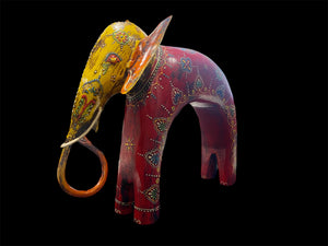 Hand made from hard wood and recycled iron, our beautiful elephant statues are painted in bright embossed detail. Large: height 27 cm, length 32 cm, depth 12 cm. Small: height 12 cm, length 15 cm, depth 6 cm