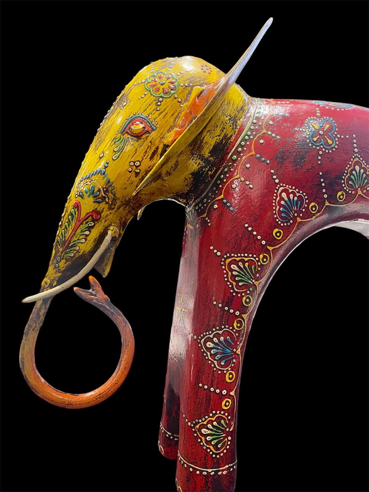 Hand made from hard wood and recycled iron, our beautiful elephant statues are painted in bright embossed detail. Large: height 27 cm, length 32 cm, depth 12 cm. Small: height 12 cm, length 15 cm, depth 6 cm