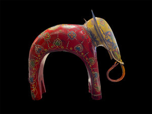 Hand made from hard wood and recycled iron, our beautiful elephant statues are painted in bright embossed detail. Large: height 27 cm, length 32 cm, depth 12 cm. Small: height 12 cm, length 15 cm, depth 6 cm