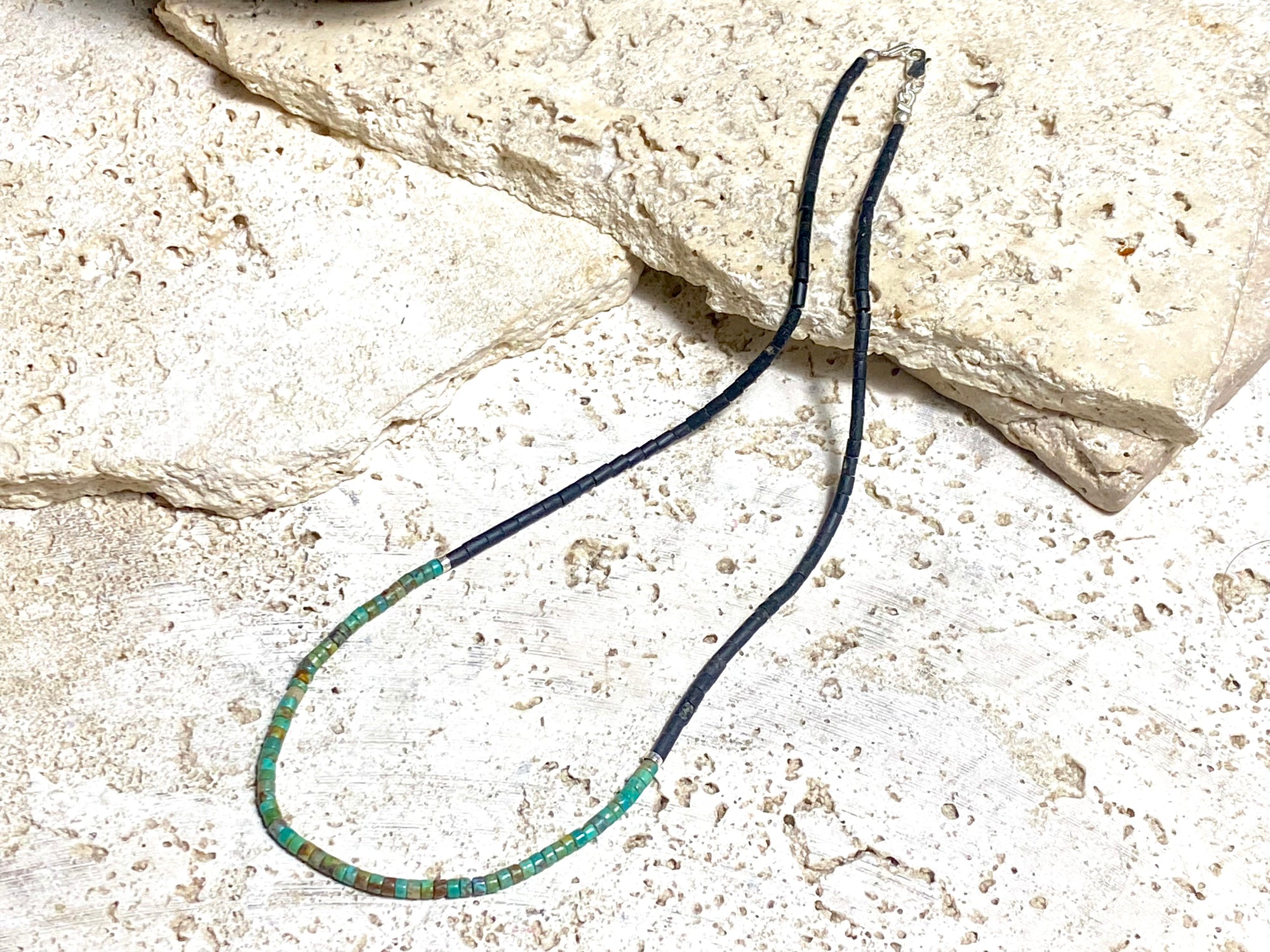 Necklace crafted from natural black Afghan serpentine and Hubei turquoise. Sterling silver clasp. Our necklace has a boho vibe and is unisex. Length 48 cm