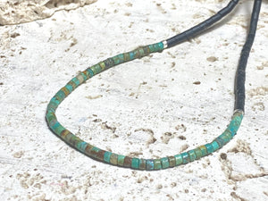 Necklace crafted from natural black Afghan serpentine and Hubei turquoise. Sterling silver clasp. Our necklace has a boho vibe and is unisex. Length 48 cm