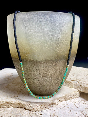 Necklace crafted from natural black Afghan serpentine and Hubei turquoise. Sterling silver clasp. Our necklace has a boho vibe and is unisex. Length 48 cm