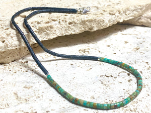 Necklace crafted from natural black Afghan serpentine and Hubei turquoise. Sterling silver clasp. Our necklace has a boho vibe and is unisex. Length 48 cm