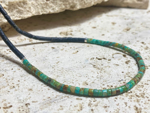 Necklace crafted from natural black Afghan serpentine and Hubei turquoise. Sterling silver clasp. Our necklace has a boho vibe and is unisex. Length 48 cm