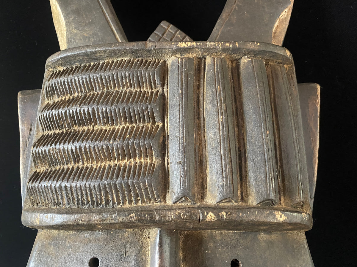 Landai mask. Toma people, Guinea, west Africa. Mid to late 20th Century. Used by the men's Poro society to initiate boys into manhood. Condition: very good. This mask dates to the mid to late 20th century. Measurements: height 83 cm, width 30 cm, depth 12 cm.