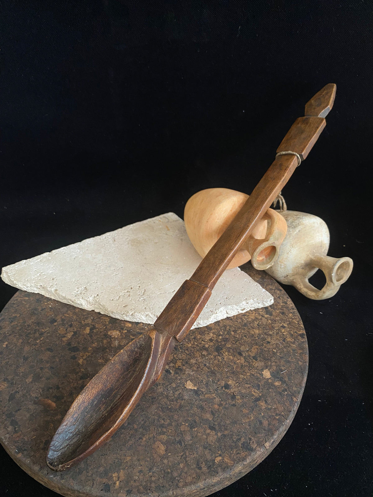 Very old wood serving spoon or ladle. Hand carved fine grained wood. From northern Ethiopia.This spoon has a lovely worn patina commensurate with its age. The spoon end is darkened from use in or near an open fire. Early 20th century. Length 44.5 cm