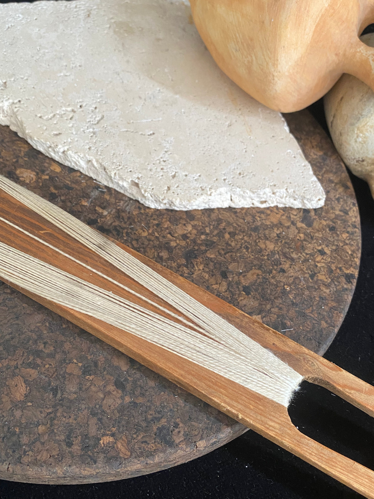 This unusual item is used to mend fishing nets. It is a very long, hand carved wood "needle" or shuttle with string or rope looped over it. If you're looking for unusual homewares or decorative items with a difference, or even a prop for a photo shoot, play or film set, this is it. Length 69 cm, width 4.5 cm