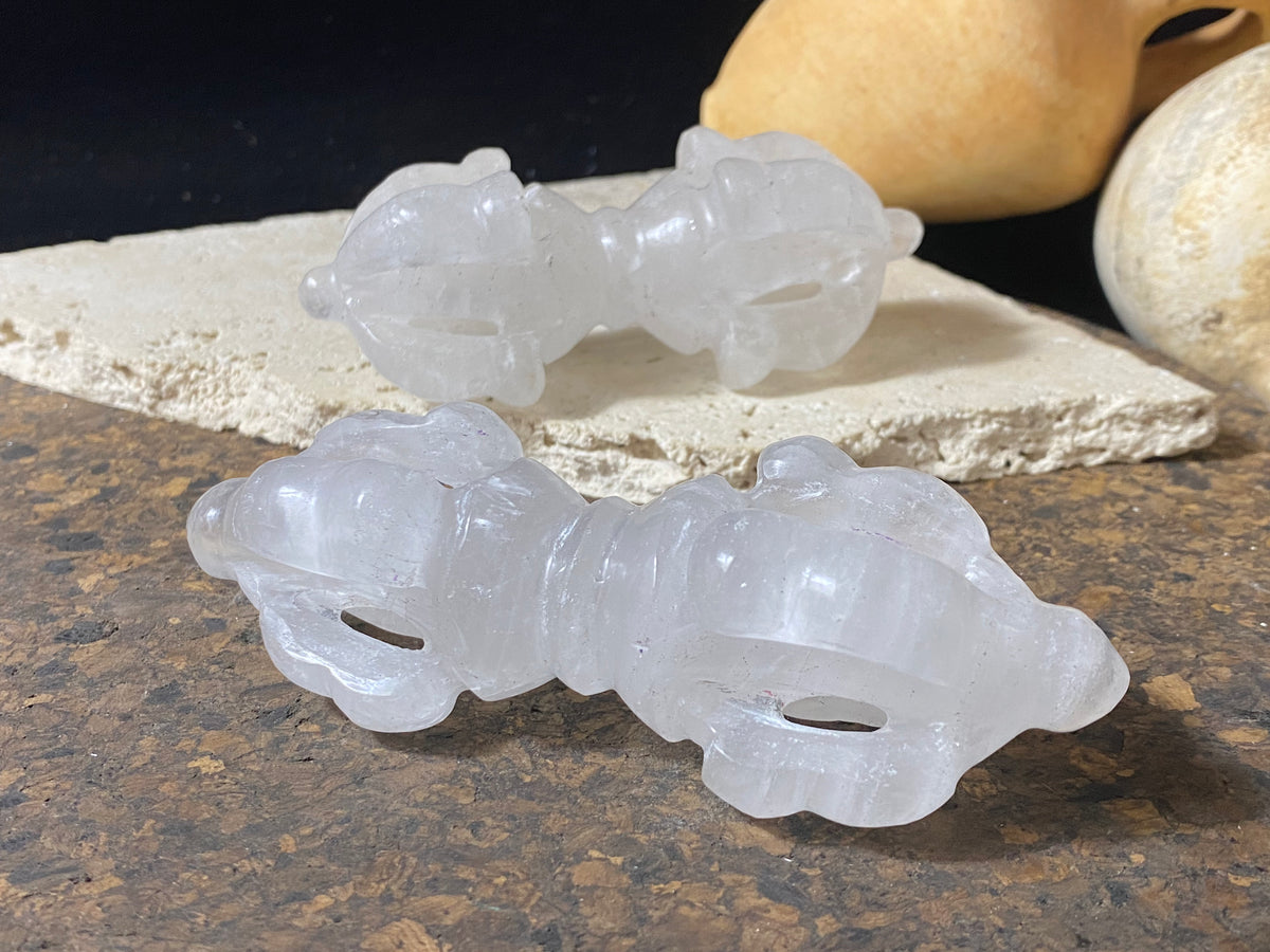 Hand carved dorje, also known as a vajra. Carved from a solid piece of Himalayan rock crystal (quartz).