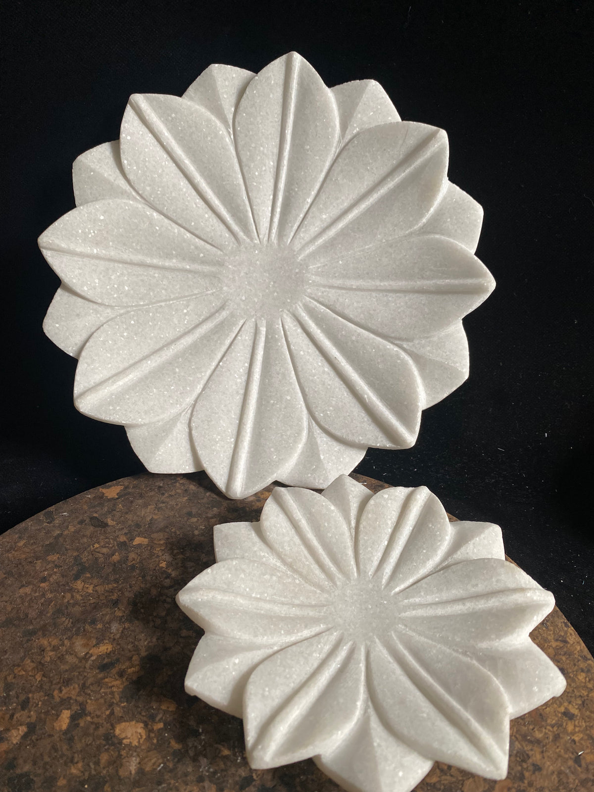 Hand crafted shallow bowls or plates, hand carved in Rajasthan from the finest local white marble in the form of an open lotus flower. Select from two sizes. Small 16 cm diameter, Large 26 cm diameter