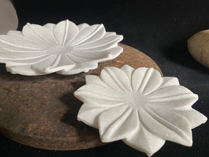 Hand crafted shallow bowls or plates, hand carved in Rajasthan from the finest local white marble in the form of an open lotus flower. Select from two sizes. Small 16 cm diameter, Large 26 cm diameter